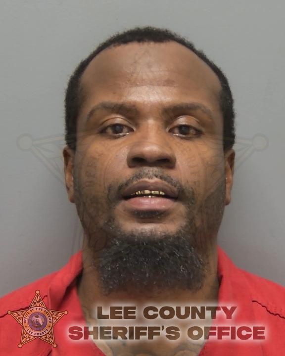 Booking photo of Michael Jean
