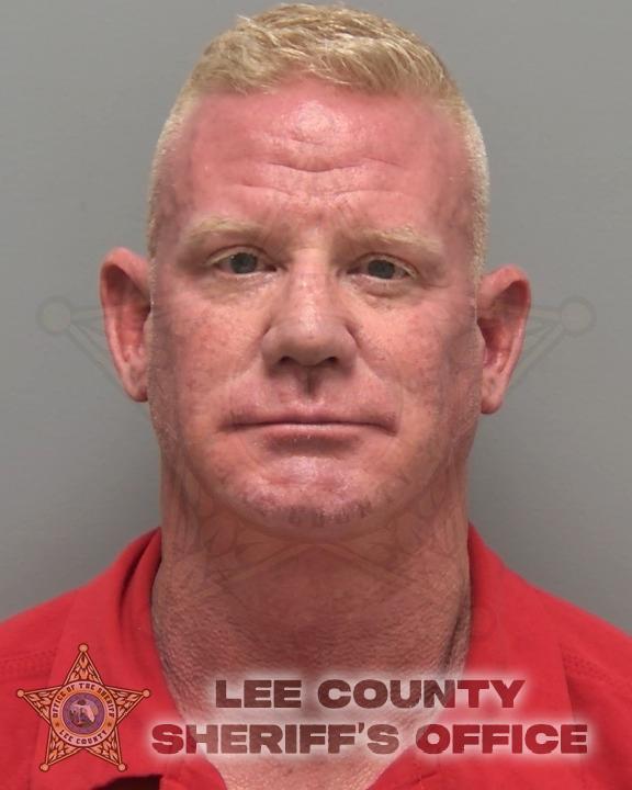 Booking photo of Justin Rauscher