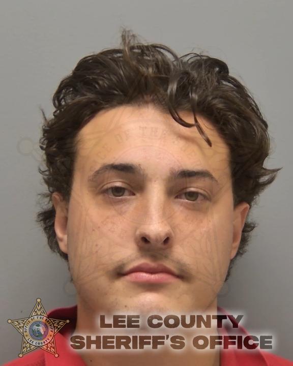Booking photo of Christopher Brewer