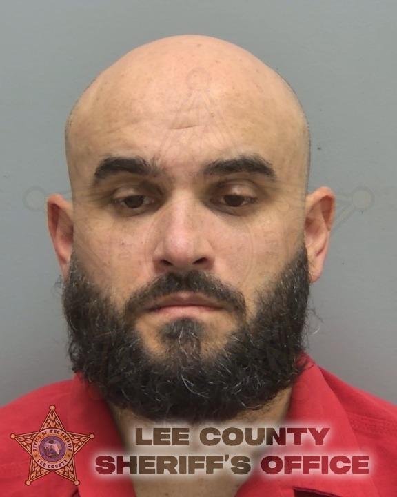Booking photo of Mujahid Ghori
