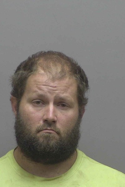 Booking photo of Andrew Miller