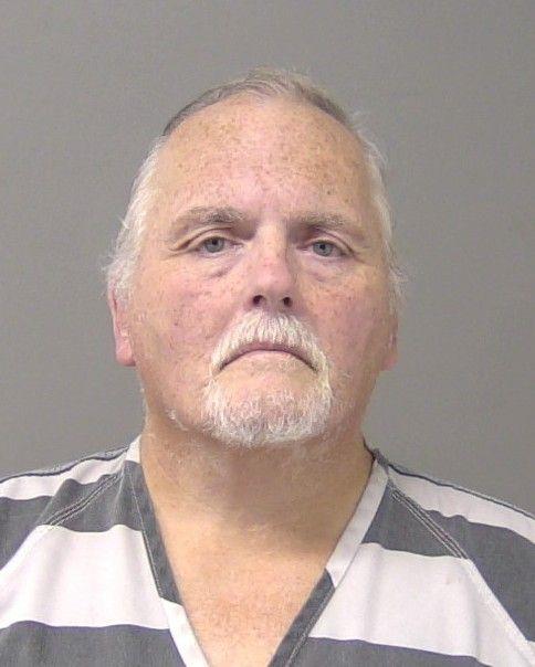 Booking photo of Gene Schuman