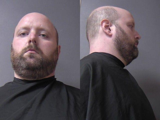 Booking photo of Joshua Carroll
