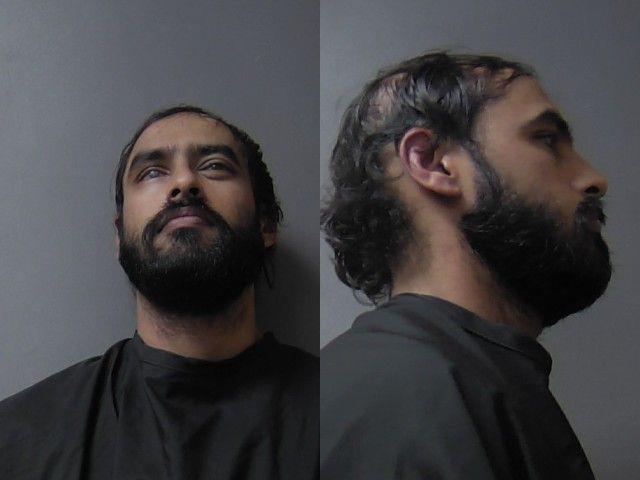 Booking photo of Justin Gill