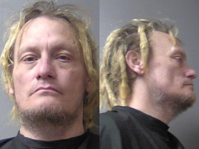 Booking photo of Joshua Rhodifer