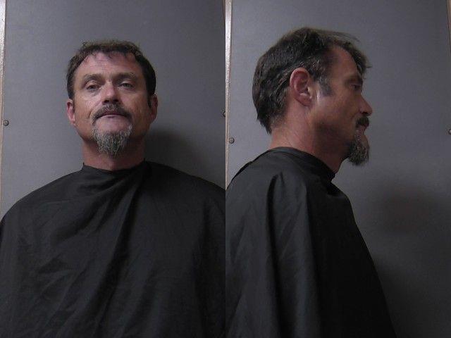 Booking photo of Brandon Cox