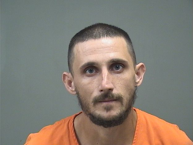 Booking photo of Tyler Russell