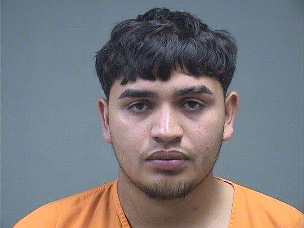 Booking photo of Bryan Flores-molina