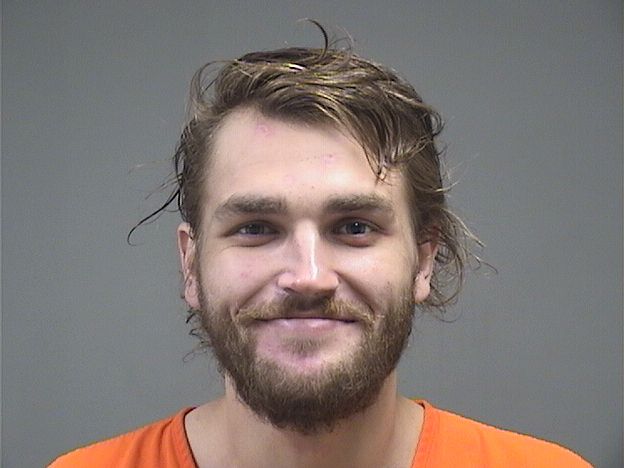 Booking photo of Michael Tomlinson