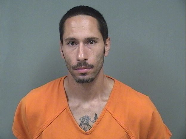 Booking photo of Justin Real