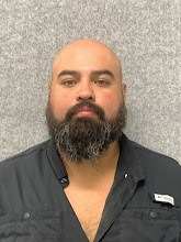 Booking photo of Angel Quiroz