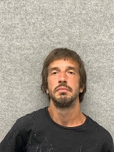 Booking photo of Derek Carlson