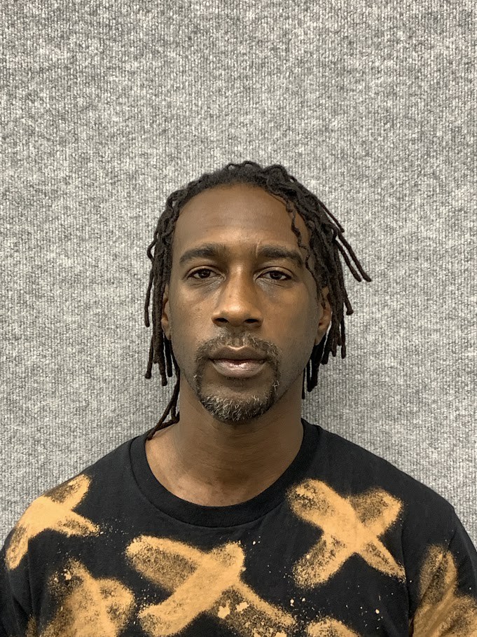 Booking photo of Richard Adegbayi