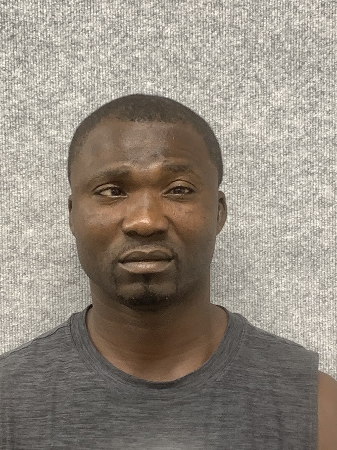 Booking photo of Sunday Adegbile