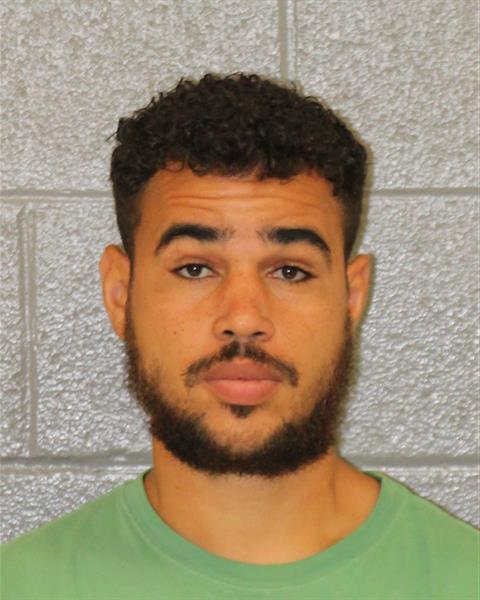 Booking photo of Devin Brewer