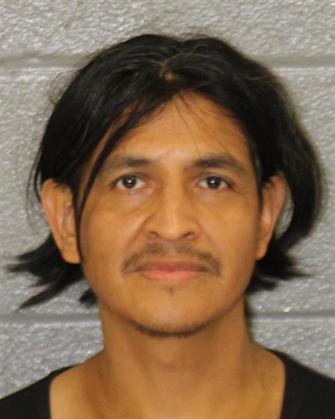Booking photo of Topilzin Mendoza