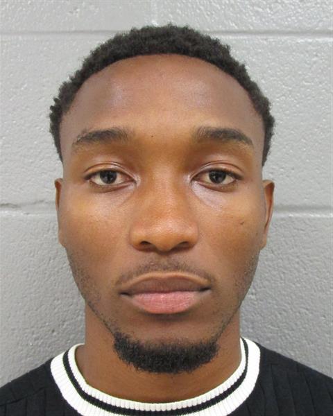 Booking photo of Enoc Lukusa