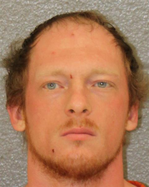 Booking photo of Tyler Hughes