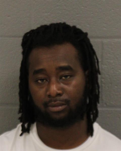 Booking photo of Maurice Muniu