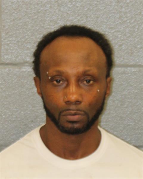 Booking photo of Warren Brown