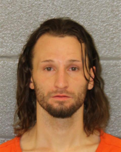 Booking photo of Tyler Rowell