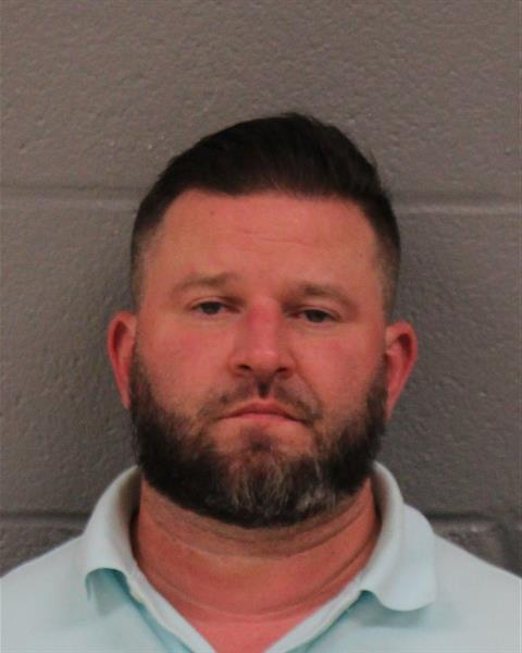 Booking photo of Christopher West