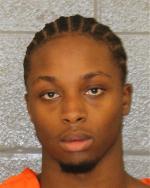 Booking photo of Cameron Moore