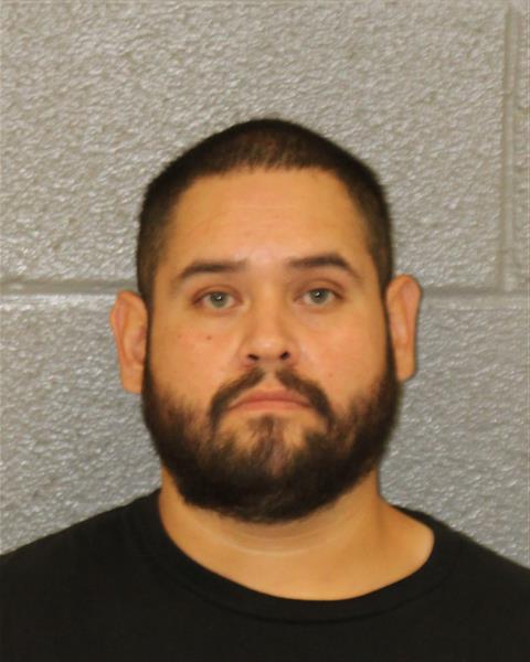 Carlos De La Torre booking photo