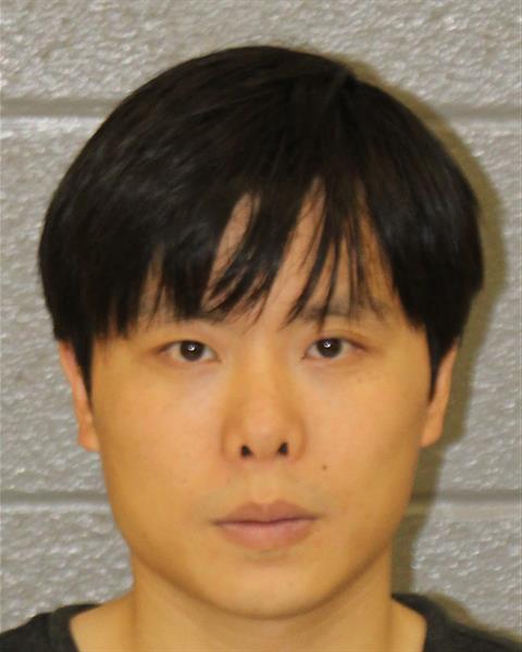 Xue Shi booking photo