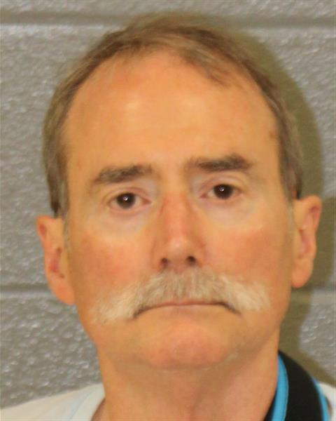 Booking photo of Ashley Caine