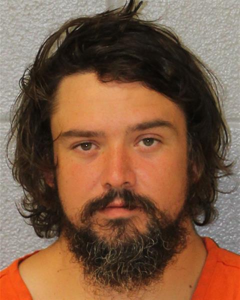 Booking photo of Alex White