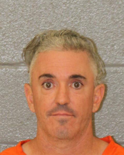 Booking photo of Brett Leek