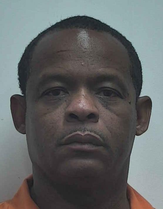 Booking photo of Johnny Scott