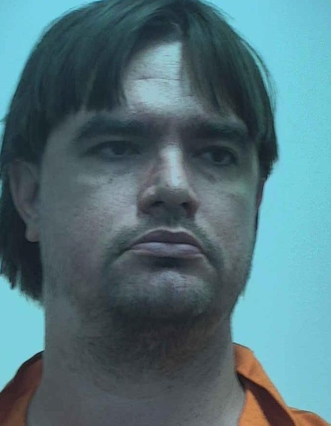 Booking photo of Christopher Gibson