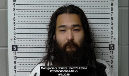 Booking photo of Garrett Min Su Michelangelo Smith