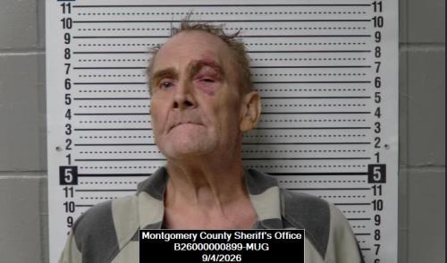 Booking photo of Michael Travis Downing