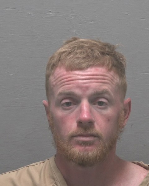 Booking photo of Casey Raynor