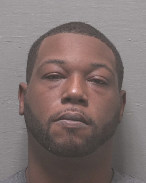 Booking photo of Malquan Dixon