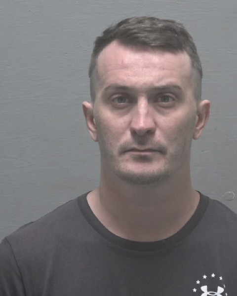 Booking photo of Drew Knowles