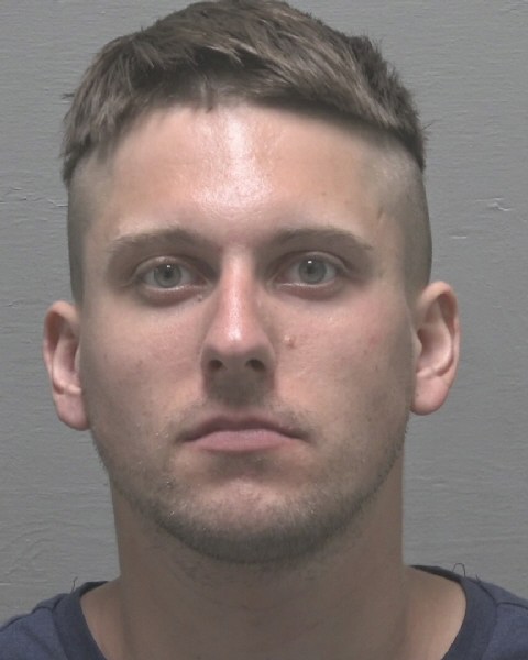 Booking photo of Erik Evans