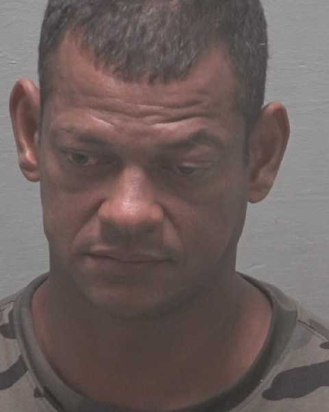 Booking photo of Jhon Mena