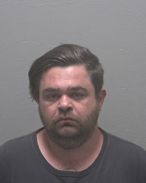 Booking photo of Adam Capps