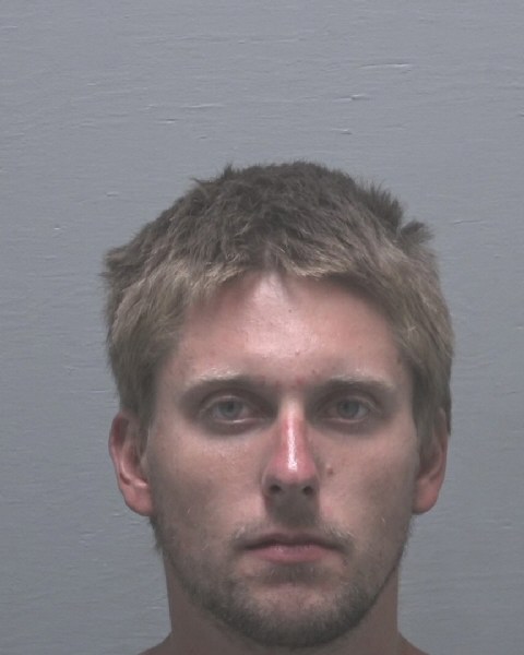 Booking photo of Erik Evans