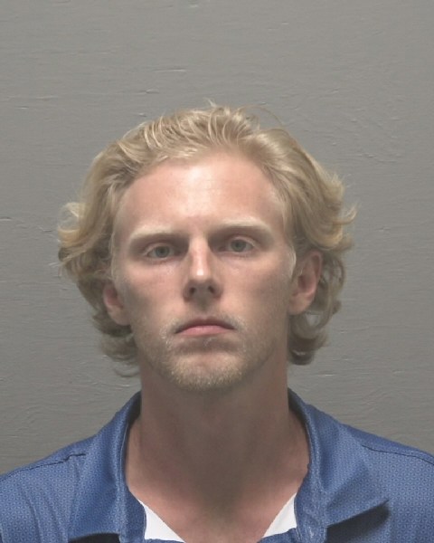 Casey Johnson booking photo