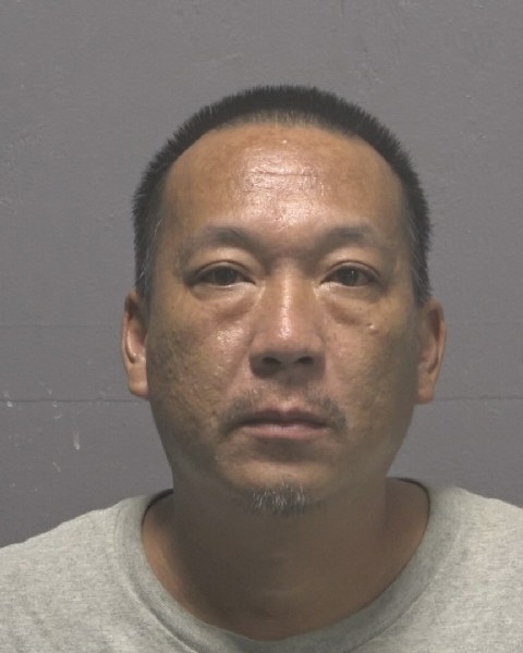 Booking photo of Le Tran