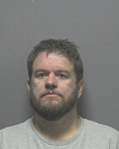 Booking photo of Adam Hayes