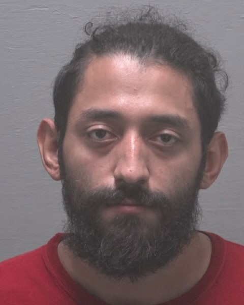 Christian Delcid booking photo