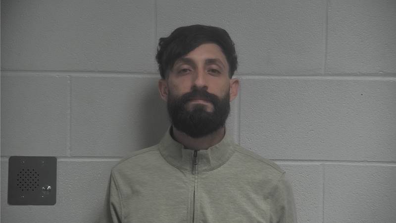 Booking photo of Carlos Romero Betancourt