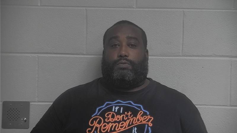 Booking photo of Travis Lewis