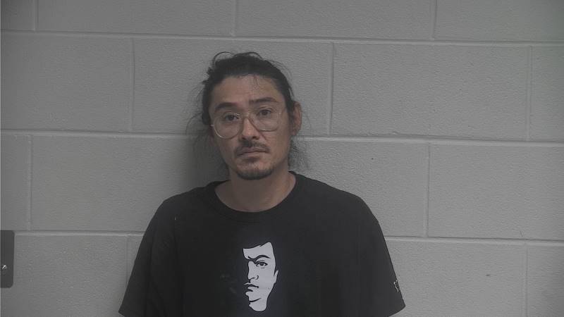 Booking photo of Troy Riddell